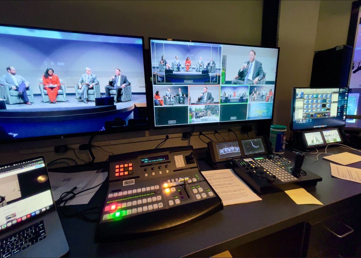 Control position with multiview monitors and a video switcher for four robotic cameras