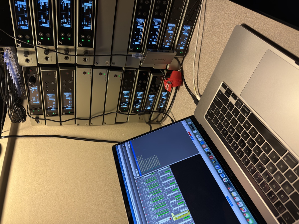 Rack of wireless microphone receivers managed from a laptop
